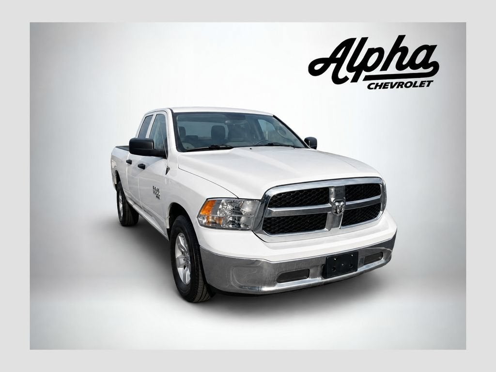 2024 RAM 1500 Classic SLT in White — front three-quarter view