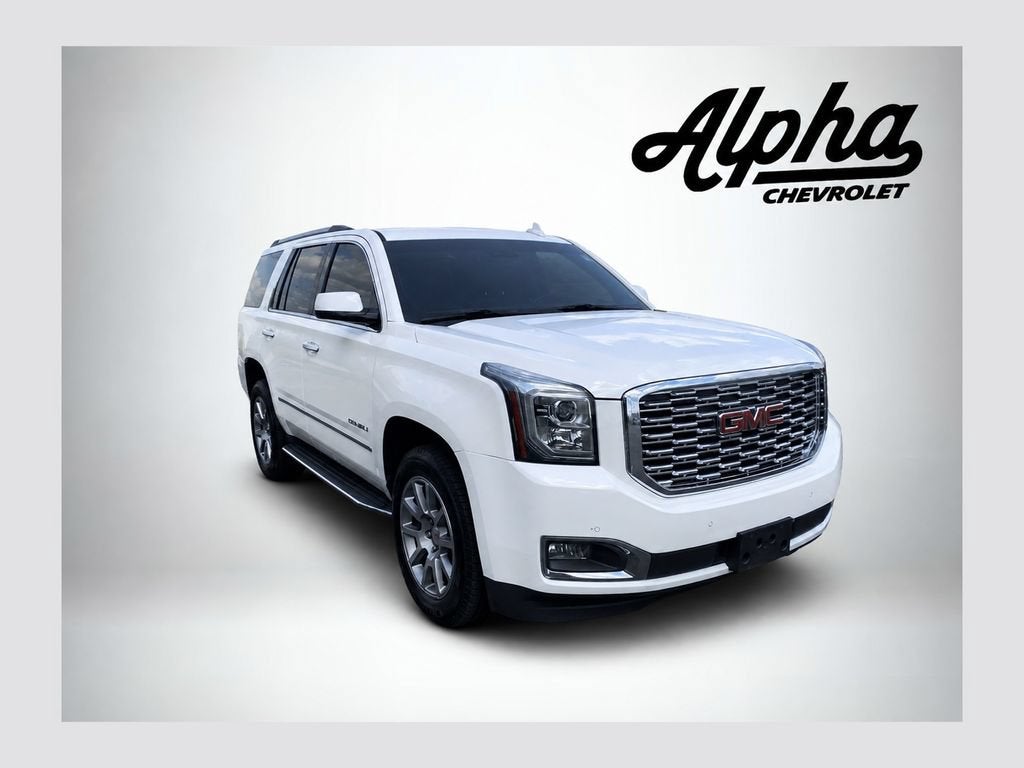 2018 GMC Yukon Denali in Summit White — front three-quarter view